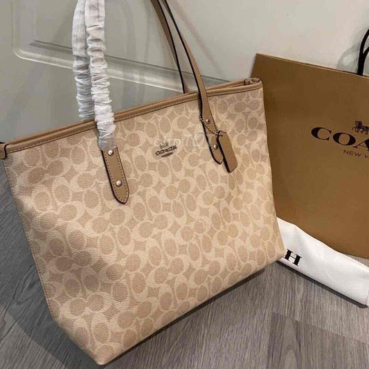 ZEVIRA'S C-O-A-C-H Tote Bag In Signature Canvas (Beige)