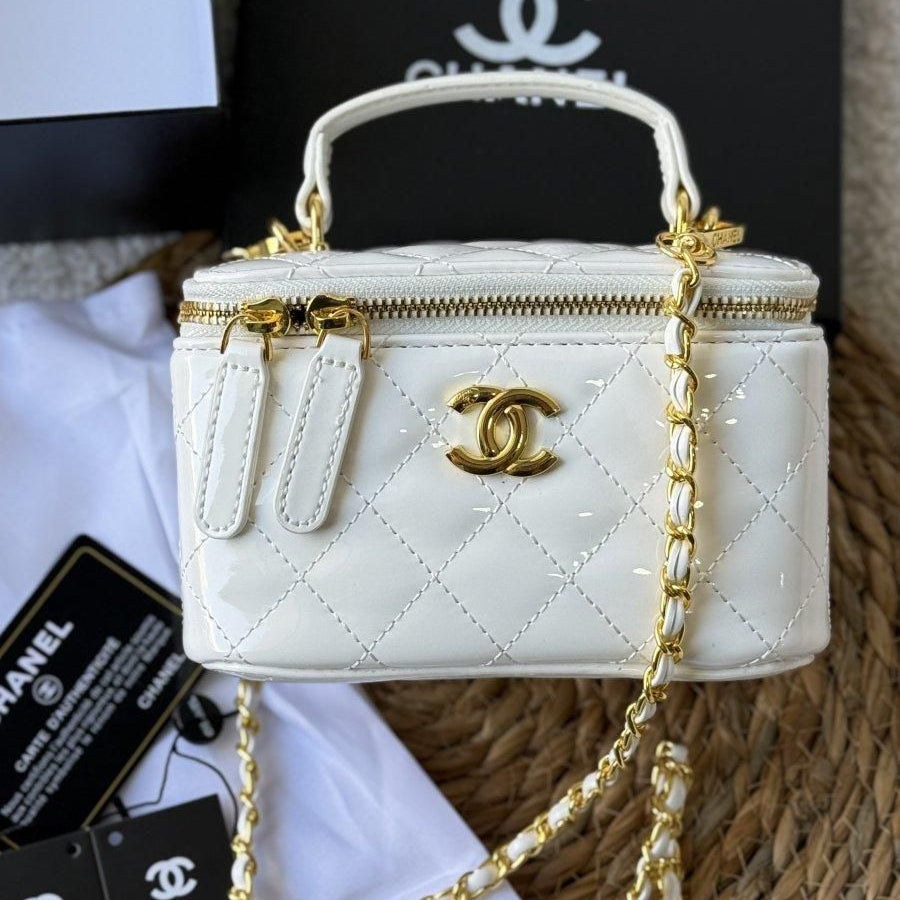 ZEVIRA'S C-H-A-N-E-L VANITY CASE (White)