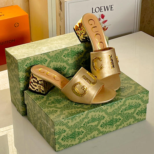 ZEVIRA'S G-U-C-C-I Imported Heeled Sandals with Signature Gold Detailing (Golden)