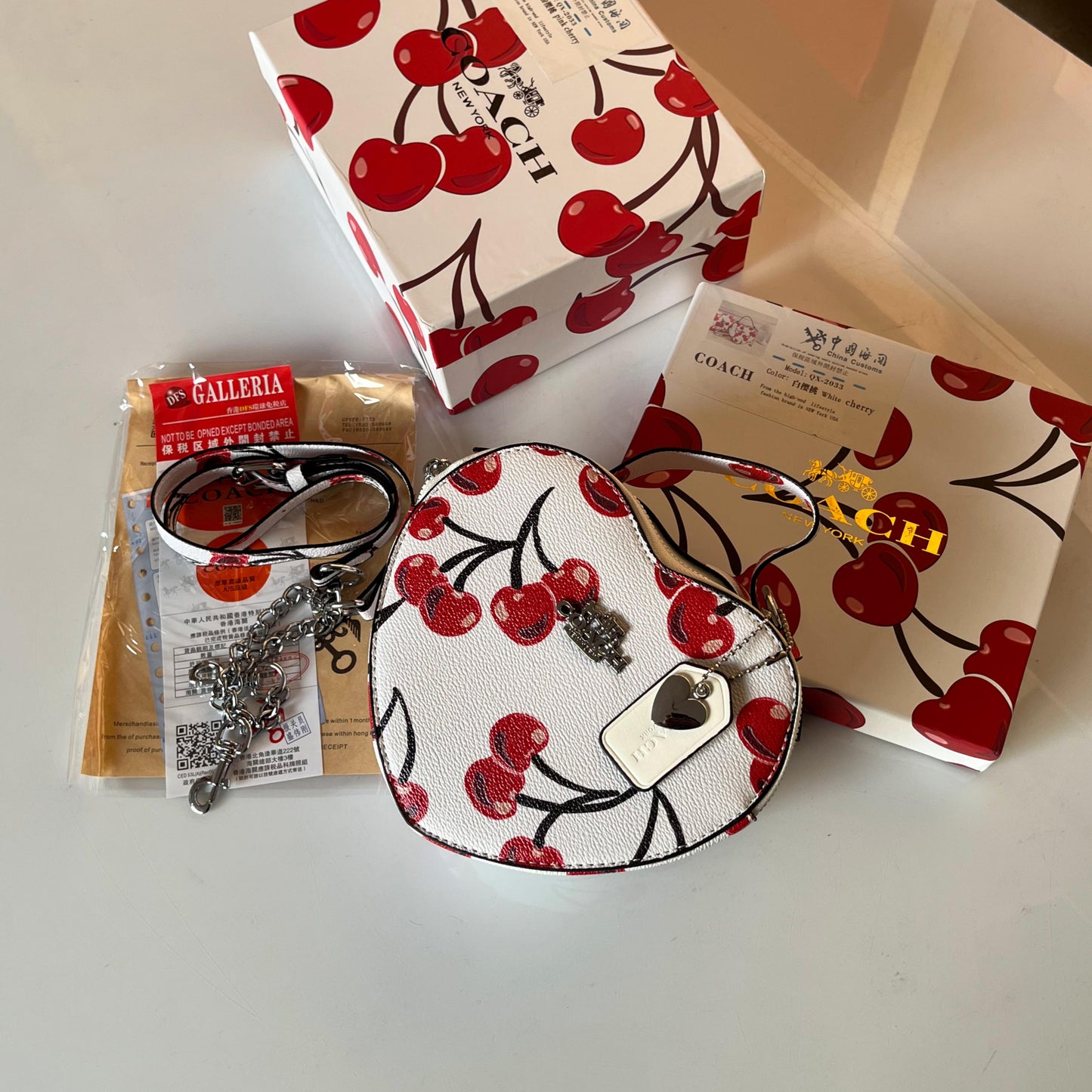 ZEVIRA'S C-O-A-C-H Heart-Shaped Crossbody Bag Signature Canvas Style (White)