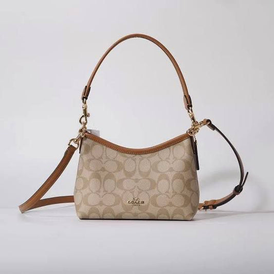 ZEVIRA'S C-O-A-C-H Laurel Mini Shoulder Bag in Signature Canvas (Brown)