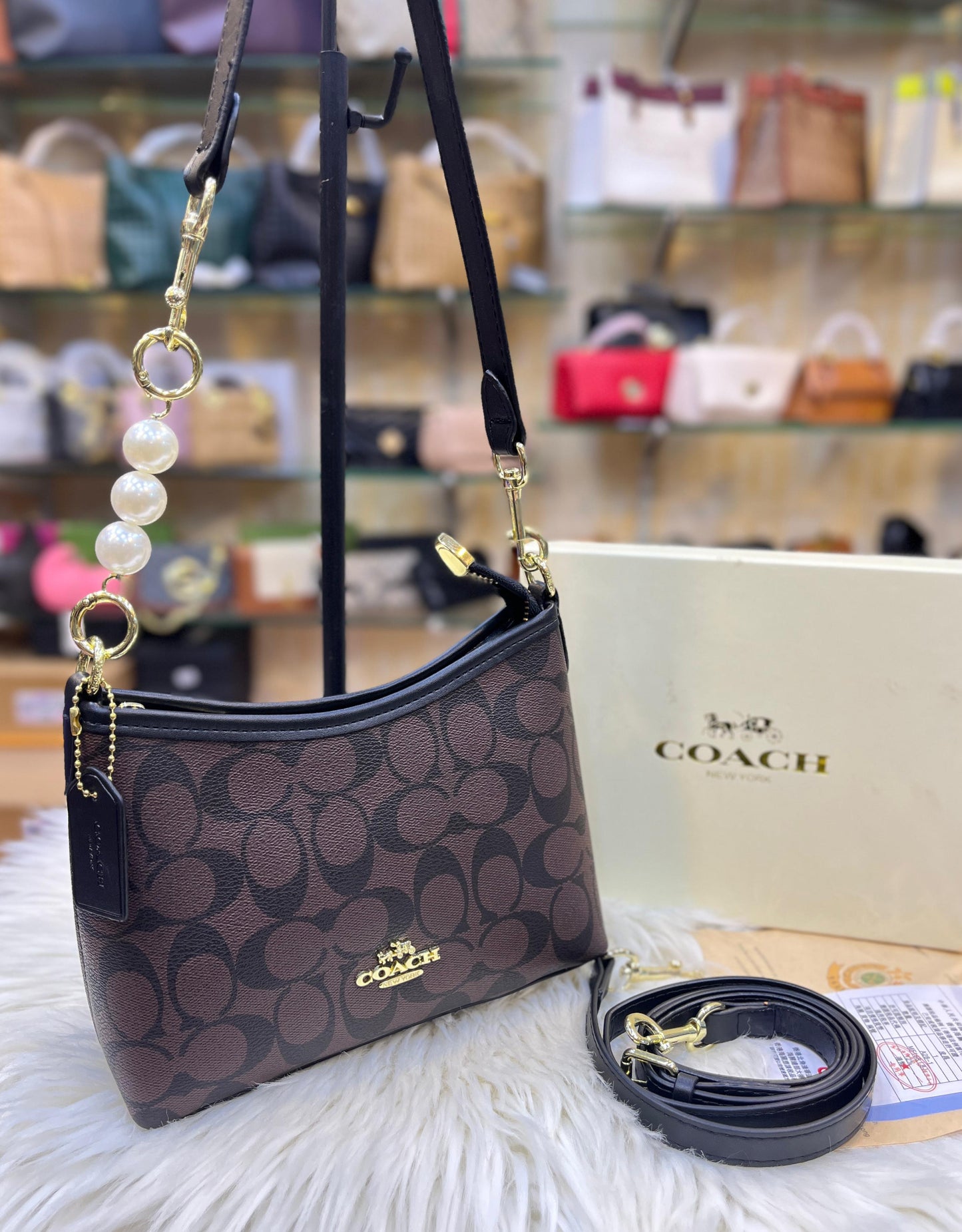 ZEVIRA'S C-O-A-C-H Laurel Mini Shoulder Bag in Signature Canvas (Brown 2)