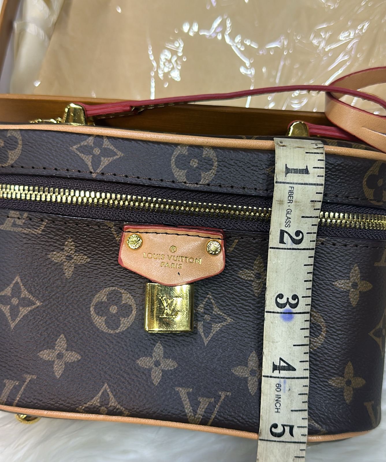 ZEVIRA'S L--V Vanity PM Monogram Reverse Canvas Handbag (Brown)