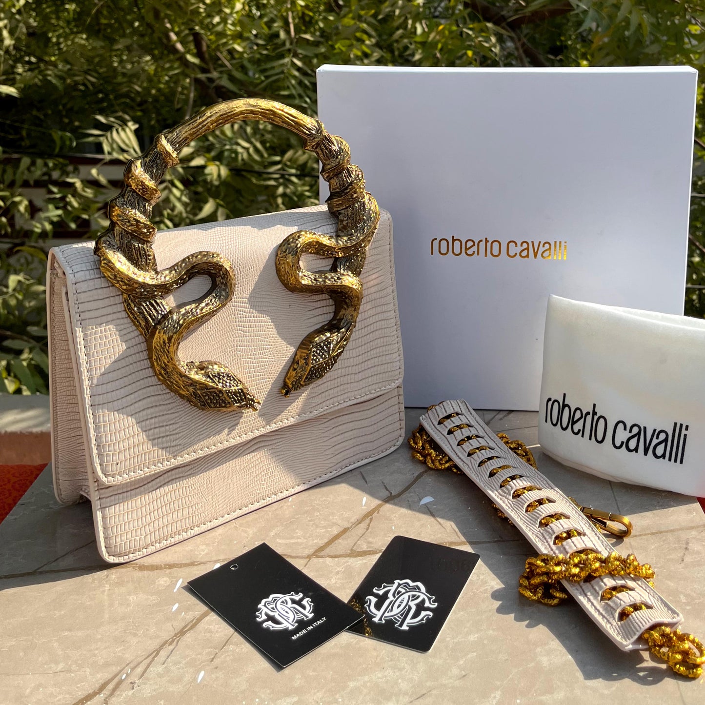 ZEVIRA'S Cobra-Textured Medium Shoulder & Hand Bag
(White)