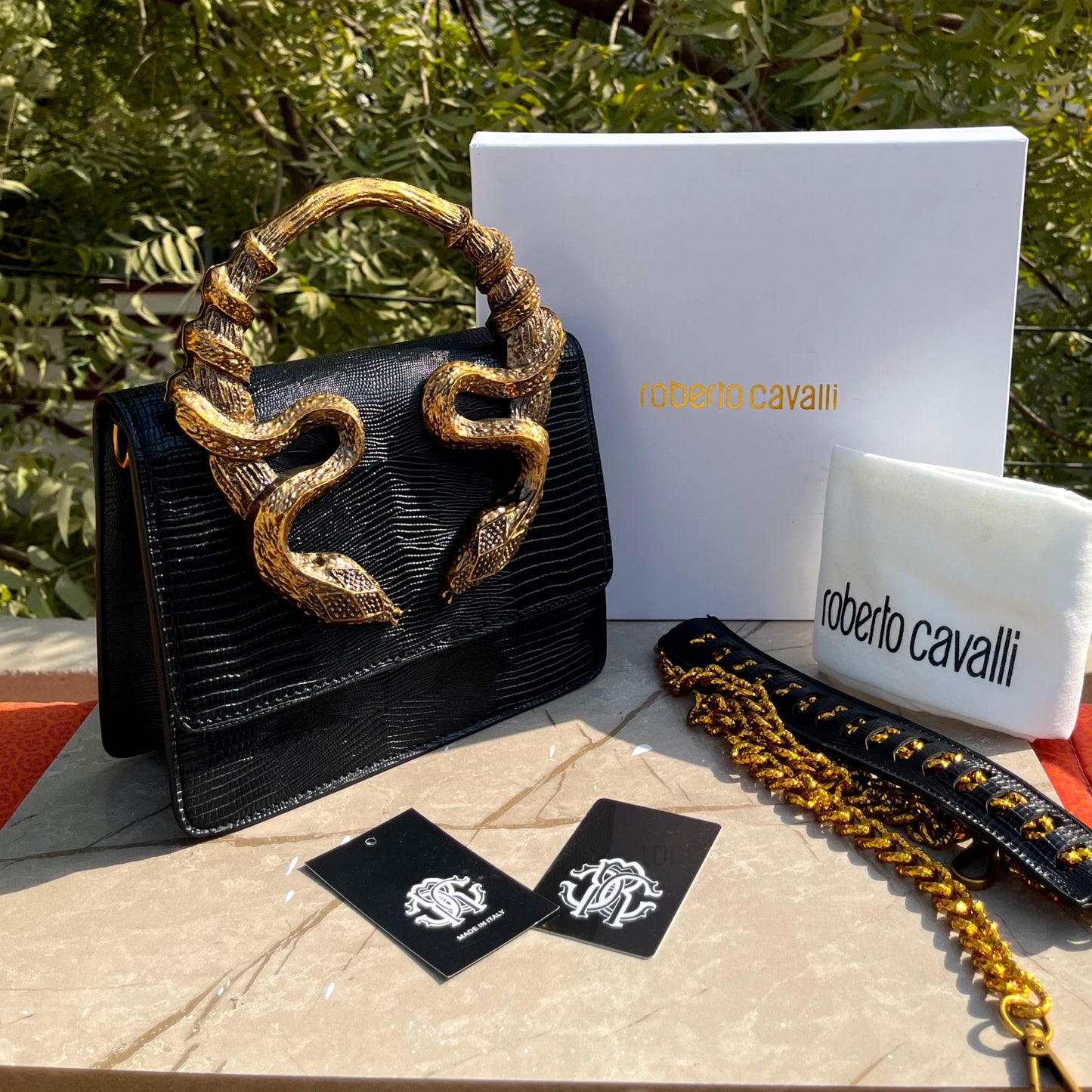 ZEVIRA'S Cobra-Textured Medium Shoulder & Hand Bag
(Black)