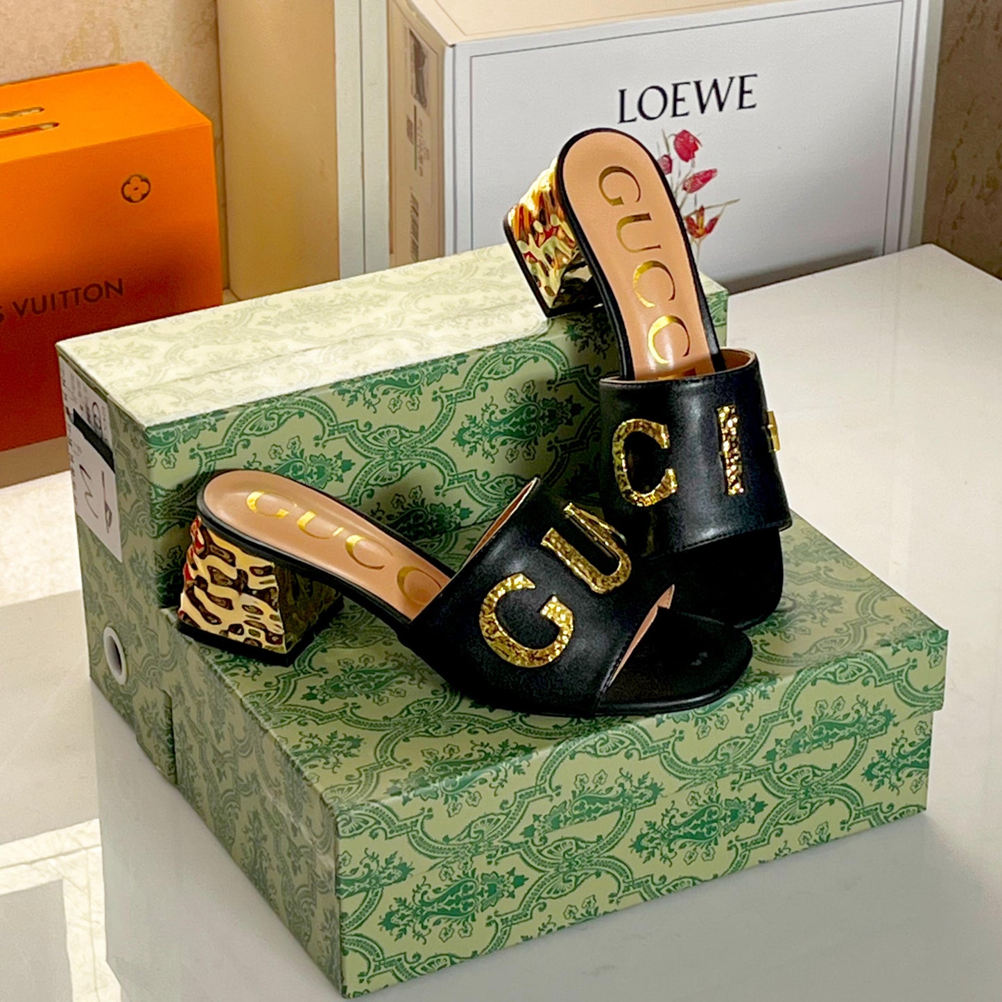 ZEVIRA'S G-U-C-C-I Imported Heeled Sandals with Signature Gold Detailing (Black)